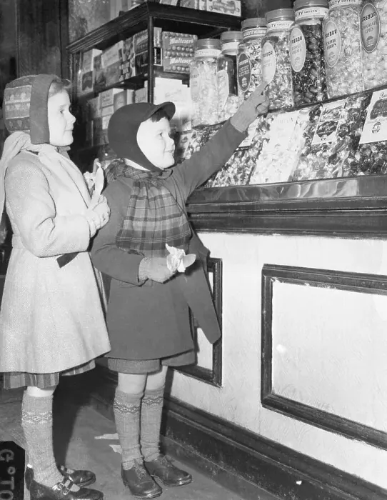 Framed Print : Girls Choosing Candy from Jar Displays Framed Print : Girls Choosing Candy from Jar Displays