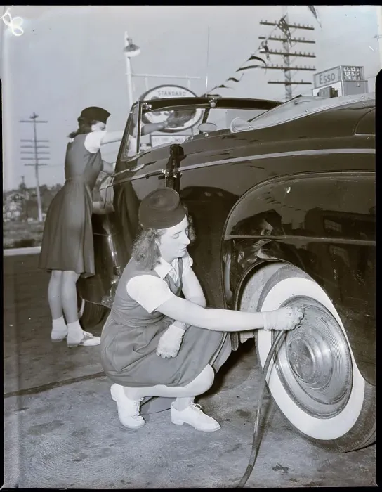 Framed Print : Girls As Gas Station Attendants Framed Print : Girls As Gas Station Attendants