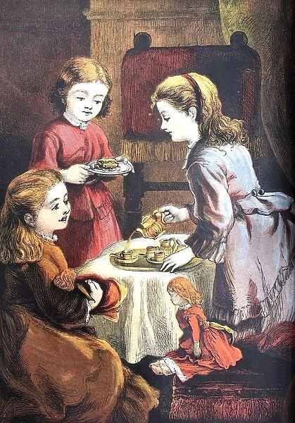 Three girls having a tea party in living room