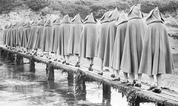 Framed Print : Girls In Hoods And Capes Along A Pier Framed Print : Girls In Hoods And Capes Along A Pier