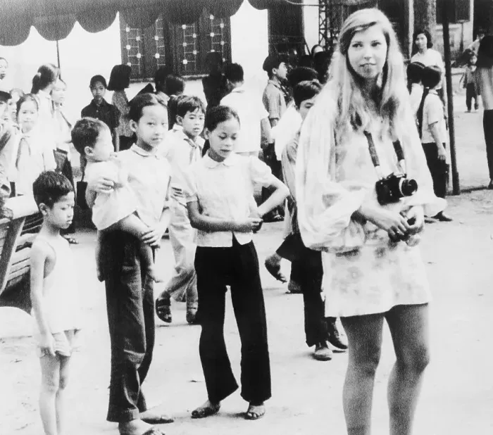 Framed Print : Girls Looking at Reporter Tracy Wood