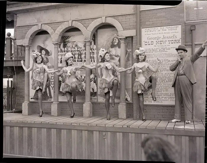 Framed Print : Show Girls Performing with Barker