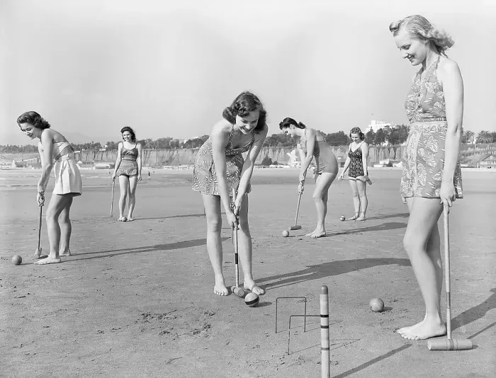 Framed Print : Girls Playing Croquet on Beach Framed Print : Girls Playing Croquet on Beach