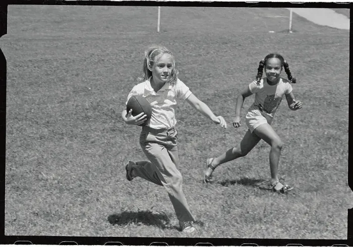 Framed Print : Two Girls Playing Touch Football Framed Print : Two Girls Playing Touch Football