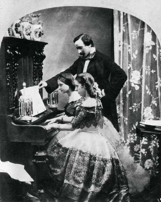 Framed Print : Two Girls Receiving Piano Lesson Framed Print : Two Girls Receiving Piano Lesson