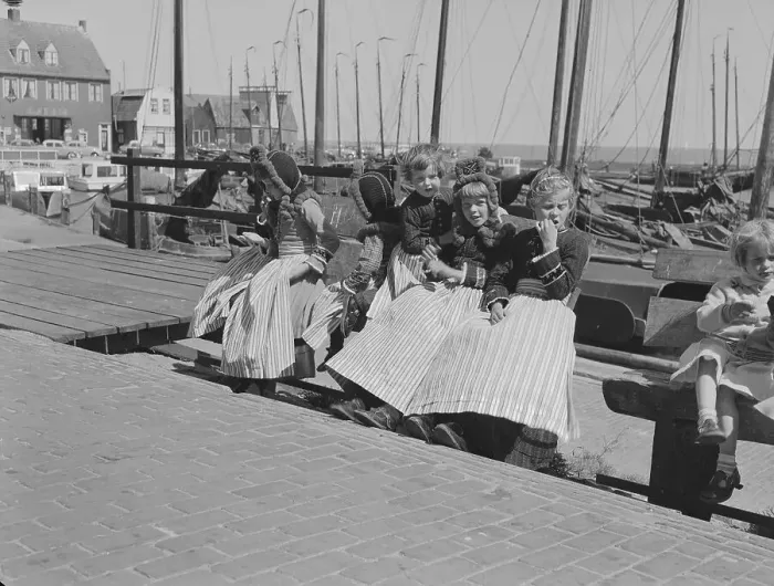 Framed Print : Girls Seated on Bench at Marina Framed Print : Girls Seated on Bench at Marina