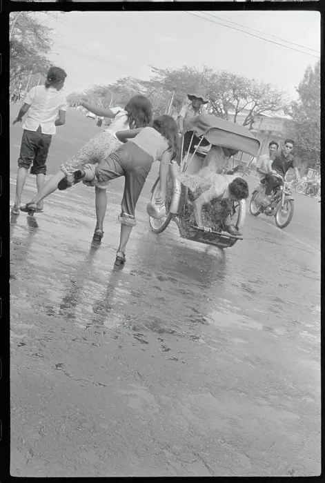 Framed Print : Girls Throwing Water Framed Print : Girls Throwing Water