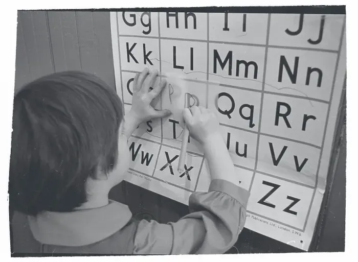 Framed Print : Girls Tracing Letters Framed Print : Girls Tracing Letters