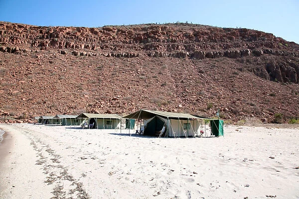 Glamping. Luxury tents at Baja Camp, eco camp on UNESCO protected island