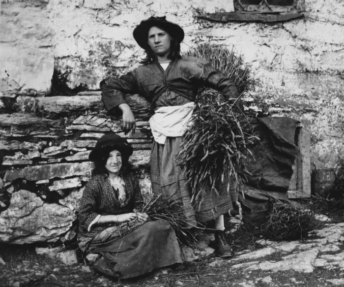 Framed Print : Gleaners. Two young women gleaners snatch a moments rest Framed Print : Gleaners. Two young women gleaners snatch a moments rest