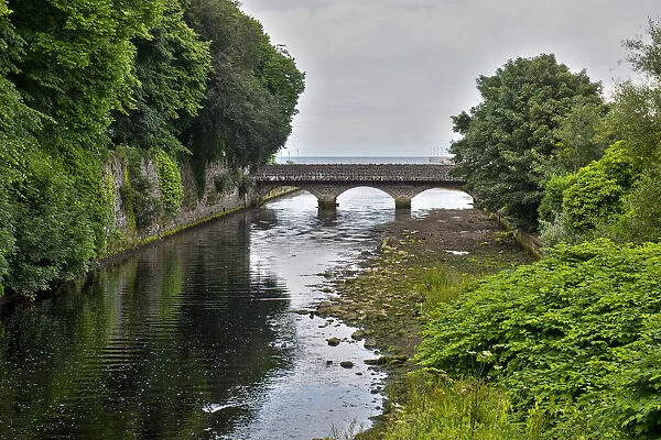 Glenarm River and bridge at Glenarm castle in County Antrim, Northern Ireland