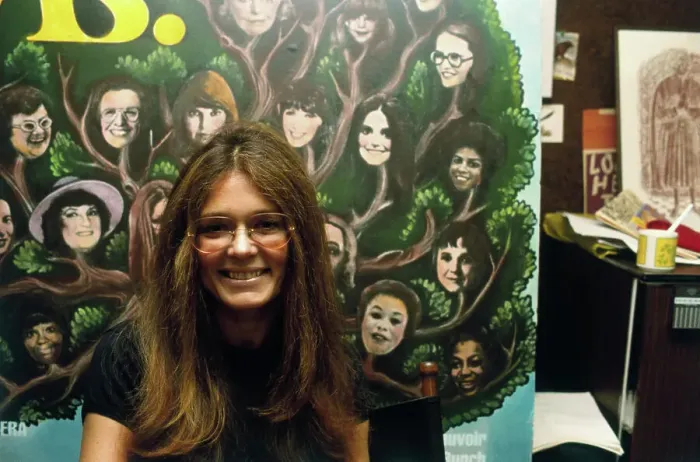 Framed Print : Gloria Steinem Posing in Front of Poster Framed Print : Gloria Steinem Posing in Front of Poster