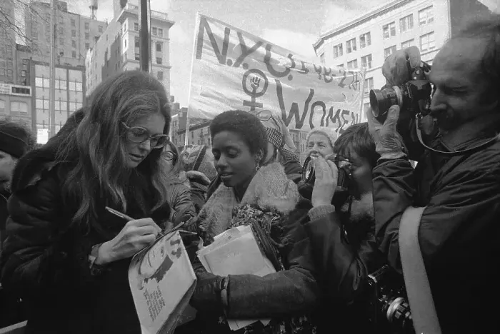 Framed Print : Gloria Steinem Signing Autographs for Demonstrators Framed Print : Gloria Steinem Signing Autographs for Demonstrators