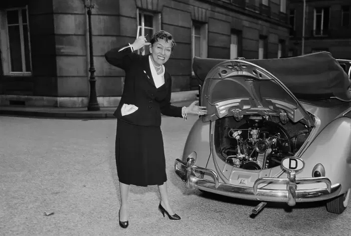 Framed Print : Gloria Swanson Posing Next to Her Car Framed Print : Gloria Swanson Posing Next to Her Car
