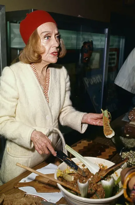 Framed Print : Gloria Swanson Preparing Food Framed Print : Gloria Swanson Preparing Food