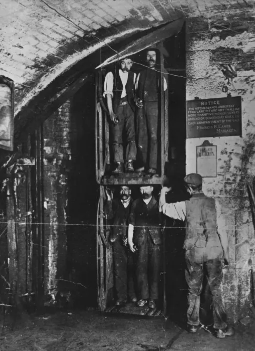 Framed Print : Going Up. circa 1900: Miners going up in the lift at the end of their shift Framed Print : Going Up. circa 1900: Miners going up in the lift at the end of their shift