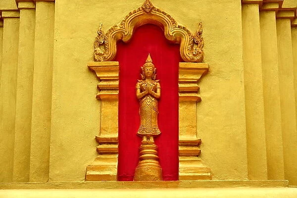 gold buddhist statue at Wat Xiengleck temple luang prabang Laos Asia