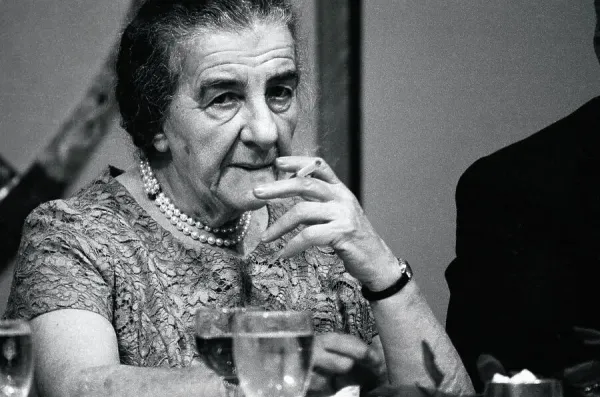 how many cigarettes did golda meir smoke a day Prints of Golda Meir Smoking at a Social Event