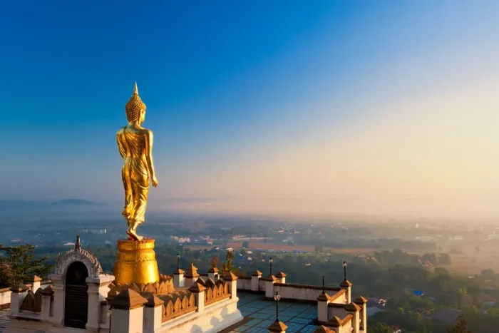 Framed Print : The golden standing buddha statue in Nan, Thailand