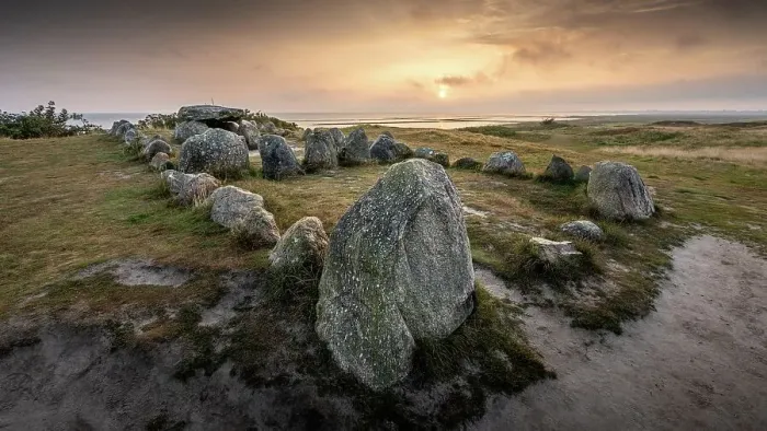 Framed Print : Golden sunrise behind the Harhoog barrow in the east of the island of Sylt, Germany Framed Print : Golden sunrise behind the Harhoog barrow in the east of the island of Sylt, Germany
