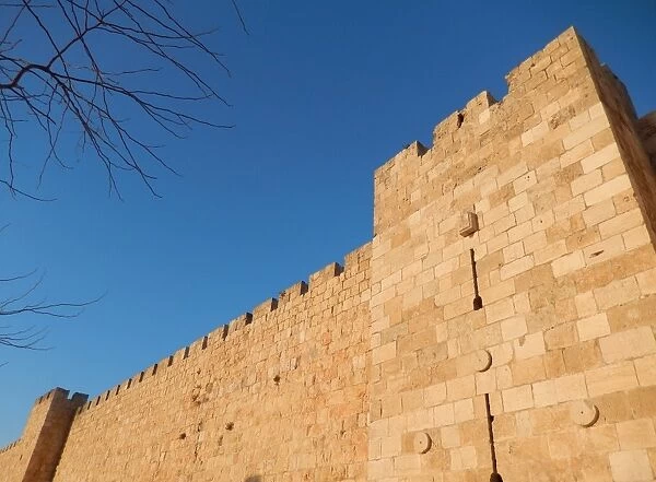 The golden walls of Jerusalem against sky