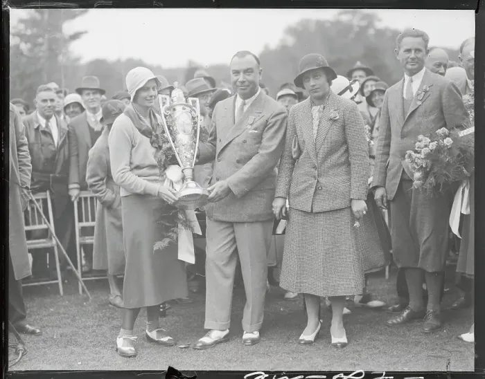 Framed Print : Golf Association President and Virginia Van Wie Holding Trophy Framed Print : Golf Association President and Virginia Van Wie Holding Trophy