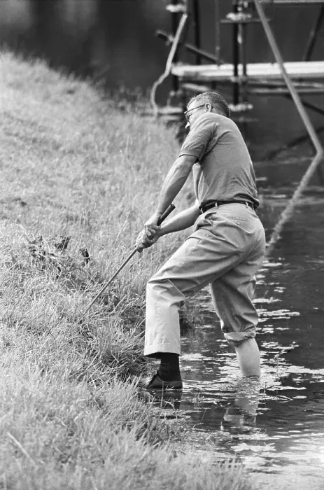 Framed Print : Golfer Billy Patton Chipping from Water Framed Print : Golfer Billy Patton Chipping from Water