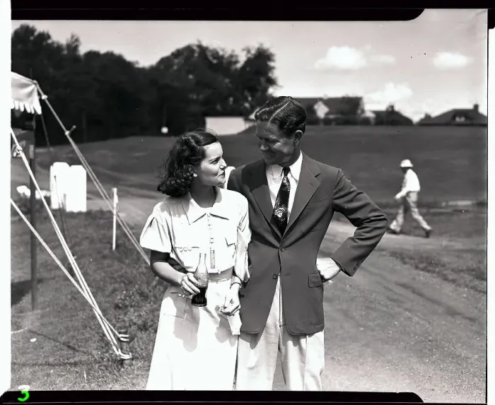 Framed Print : Golfer Byron Nelson Exchanging Smile with Wife