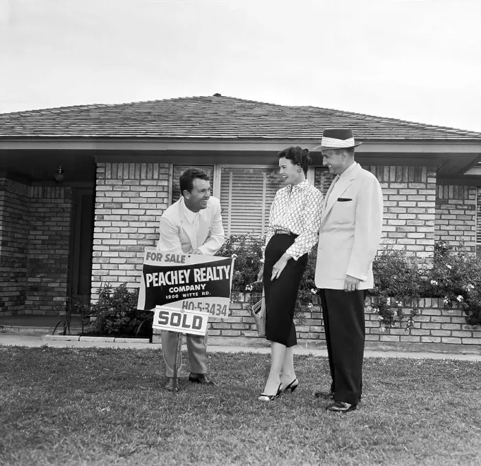 Framed Print : Golfer Jack Burke Selling House to Couple Framed Print : Golfer Jack Burke Selling House to Couple