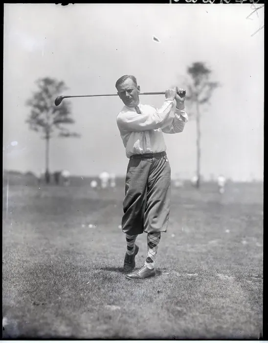Framed Print : Golfer in Post-Swing Position