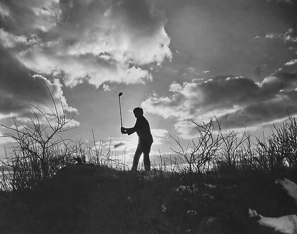 Golfer In Silhouette