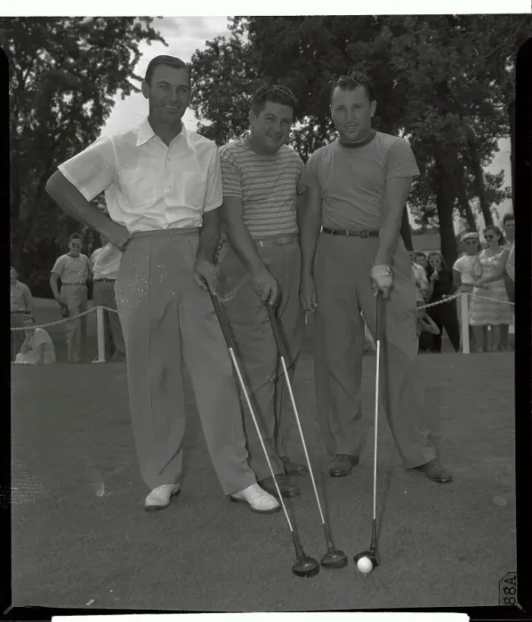 Framed Print : Golfers Standing and Holding Putters Framed Print : Golfers Standing and Holding Putters