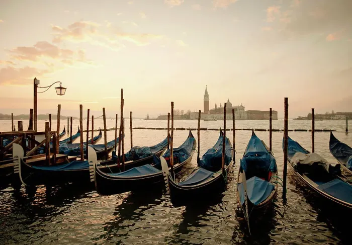 Framed Print : Gondolas docked in harbor
