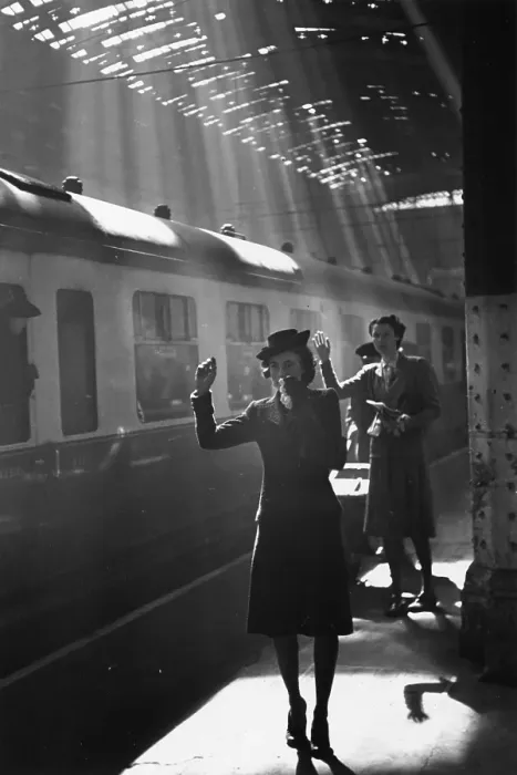 Framed Print : Goodbye. Tearful wives waving goodbye as a troop train pulls out of a station Framed Print : Goodbye. Tearful wives waving goodbye as a troop train pulls out of a station