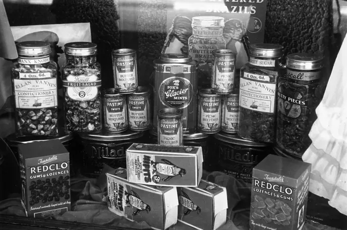 Framed Print : Goodies. circa 1950: Some of the goods on sale in a confectioners shop include Framed Print : Goodies. circa 1950: Some of the goods on sale in a confectioners shop include