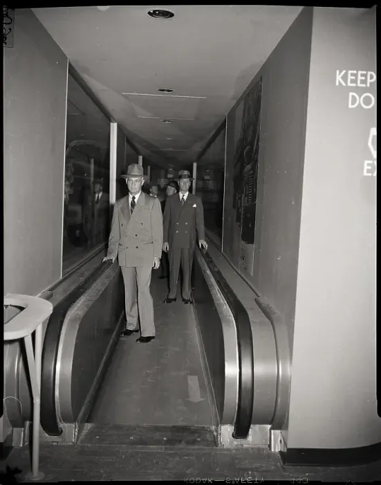 Framed Print : Goodrich Officials on Moving Sidewalk Framed Print : Goodrich Officials on Moving Sidewalk