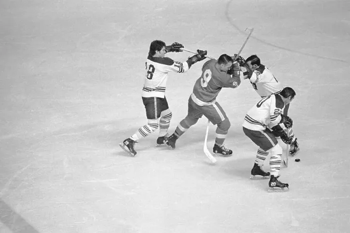 Framed Print : Gordie Howe Battles Opposing Players Framed Print : Gordie Howe Battles Opposing Players