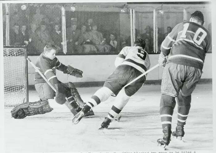 Framed Print : Gordie Howe Getting Checked Framed Print : Gordie Howe Getting Checked