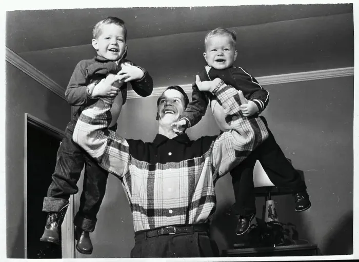 Framed Print : Gordon Howe Holding His Sons in Air Framed Print : Gordon Howe Holding His Sons in Air