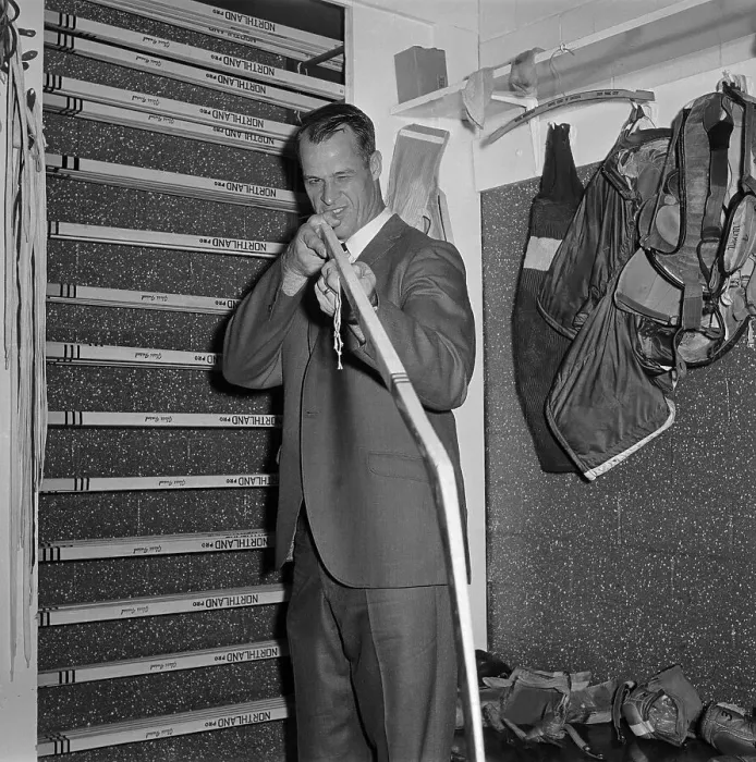 Framed Print : Gordon Howe Looks Down Shaft of Hockey Stick Framed Print : Gordon Howe Looks Down Shaft of Hockey Stick