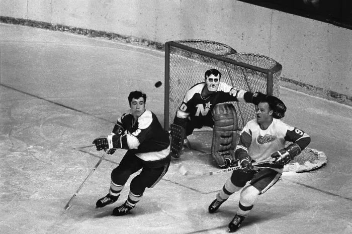 Framed Print : Gordon Howe and Opponent Go for Airborne Puck Framed Print : Gordon Howe and Opponent Go for Airborne Puck