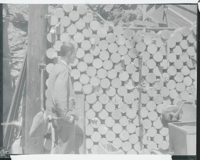 Framed Print : Government Worker Examining Cement Collection