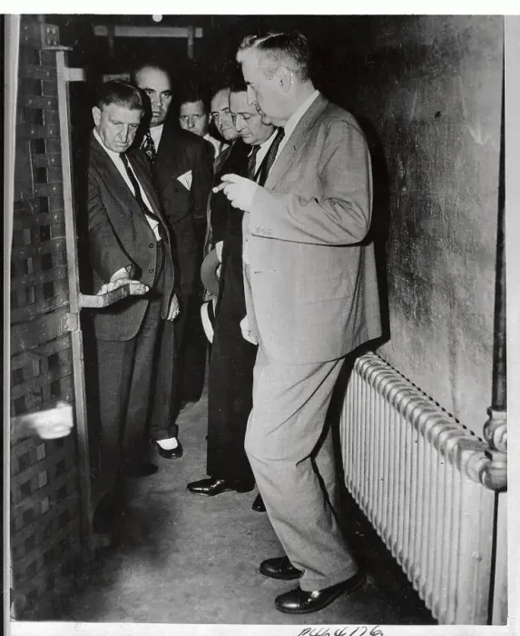 Framed Print : Governor and Officials Examining Solitary Confinement Cell Block