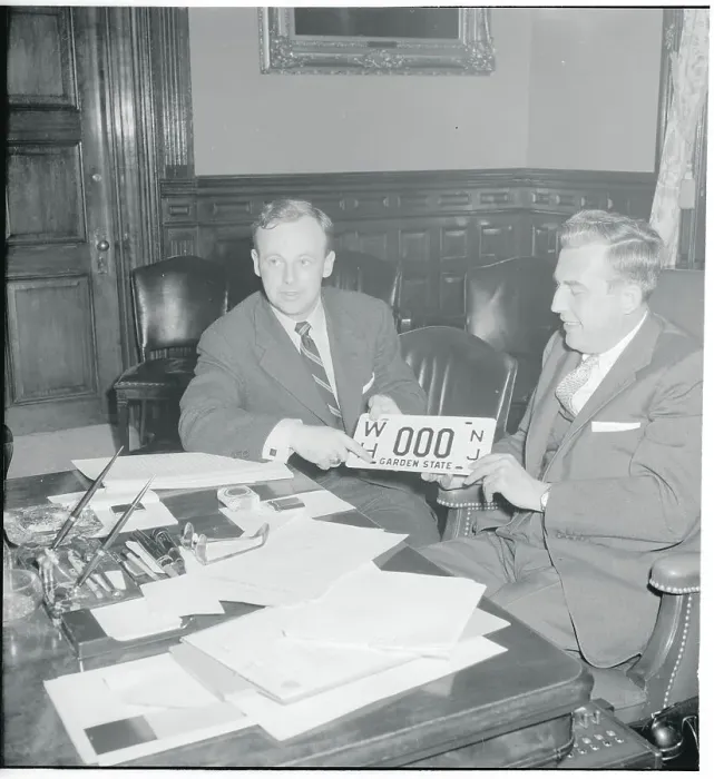 Framed Print : Governor Robert B. Meyner and Frederick J. Gassert Jr. Showing New Jersey's New License Plates Framed Print : Governor Robert B. Meyner and Frederick J. Gassert Jr. Showing New Jersey's New License Plates