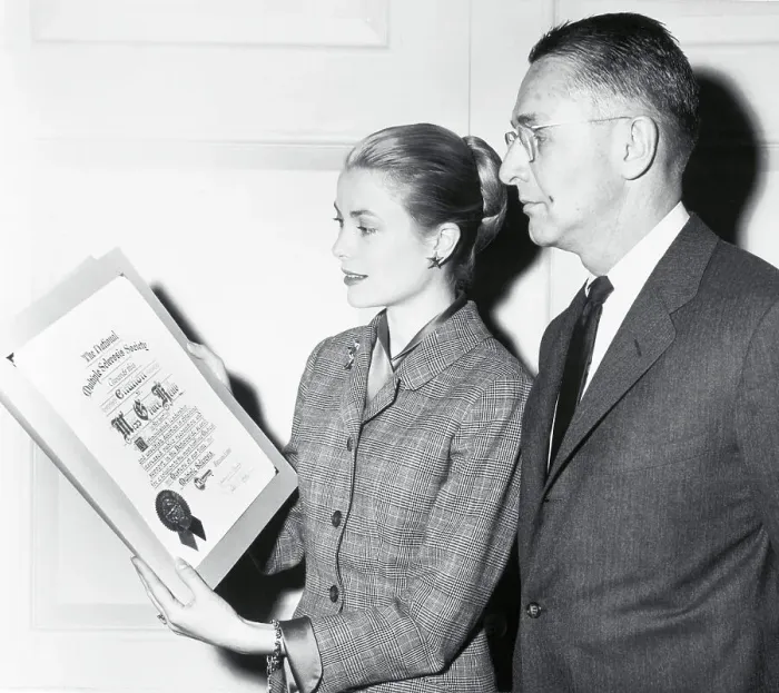 Framed Print : Grace Kelly Holding an Award Framed Print : Grace Kelly Holding an Award