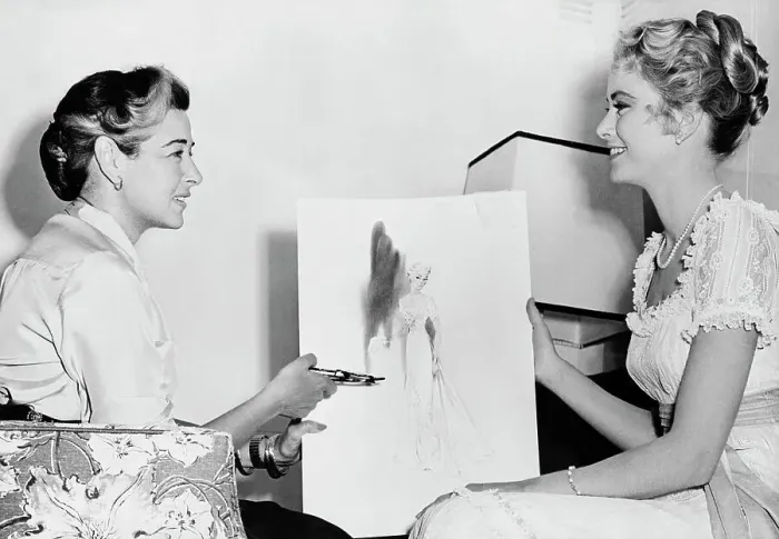 Framed Print : Grace Kelly Talking To Designer; Seated Framed Print : Grace Kelly Talking To Designer; Seated