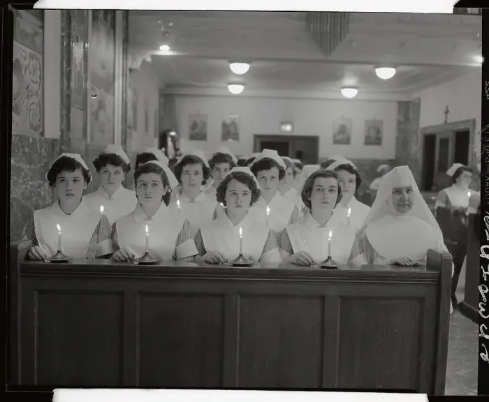 Framed Print : Graduating Nurses Kneeling in Chapel Framed Print : Graduating Nurses Kneeling in Chapel