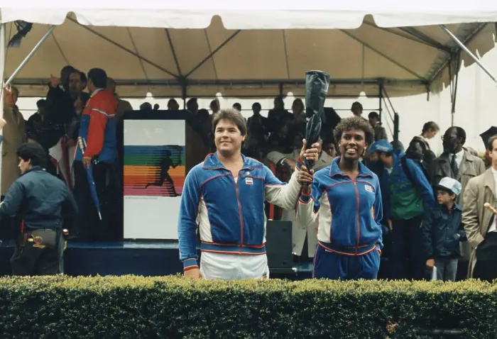 Framed Print : Grandchildren Of Jesse Owens And Jim Thorpe With Olympic Torch