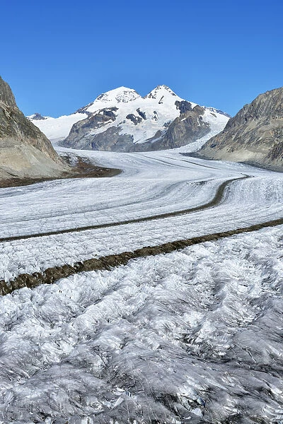 Great Aletsch Glacier, the mountains Eiger, Monch and Jungfrau at the back, Canton of Valais, Goms, Switzerland