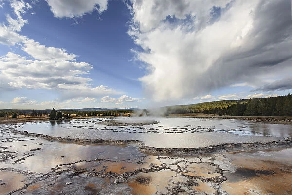 Great Fountain Geyser in Lower Geyser Basin on sunny day, Yellowstone National Park, Wyoming, USA
